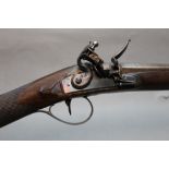 A flintlock single barrelled sporting shotgun, probably 20 bore having a 36 1/2" barrel,