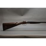 Edwinson Green & Sons a 12 bore side by side shotgun, with 28" barrels, cylinder and quarter choke,