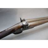 Malbon of Chester, possibly a 6 bore side by side percussion shotgun, with 33" Damascus barrels,