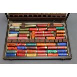 An oak canteen filled with various collectors cartridges, 12, 20, 410 bore,