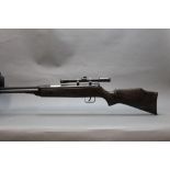 A Chinese cal 22 underlever air rifle, fitted with a 4 x 20 telescopic sight,