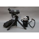 A Bushnell 16 x 52 spotting scope with tripod,