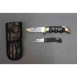 Kershaw two folding pocket knives, blade lengths 3 1/2" and 2 1/2" model No. 1050 and 3000A.