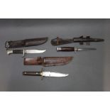 Three fixed blade knives, a J Weiss & Son with horn grips 5" blade,