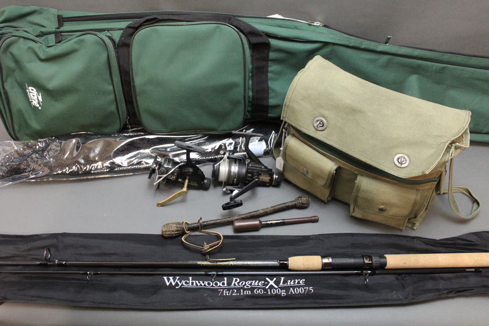 A Wychwood Rogue-X lure rod, in two sections, 7', together with a Crane Sports rod bag, landing net,