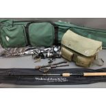 A Wychwood Rogue-X lure rod, in two sections, 7', together with a Crane Sports rod bag, landing net,