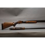 Miroku a 12 bore over/under shotgun, with 26" barrels, cylinder and cylinder choke, 2 3/4" chambers,