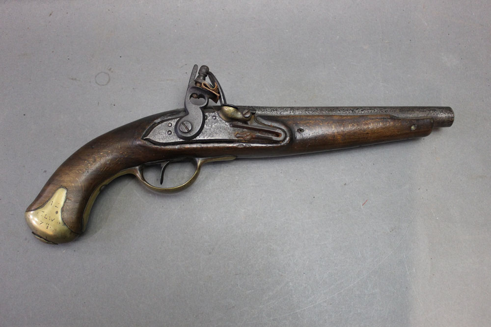 A military style flintlock pistol, having a steel 9 1/2" barrel,