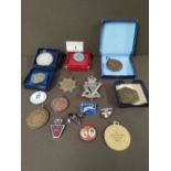 Bag of commemorative medals, railway token,