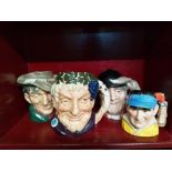 Four character jugs by Royal Doulton to include The Poacher and Bacchus