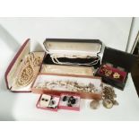 A box of costume jewellery, to include wristwatch, necklaces,