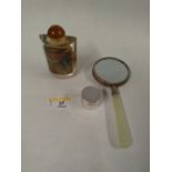 A white metal oriental pill box, a small magnifying glass with blue and white panda back,