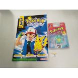 A Pokemon "Gotta Catch Em All" Issue 1 magazine and a Squirtle keyring