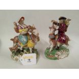 Two continental porcelain figural ornaments of figures riding goats