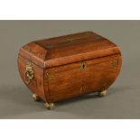 A Regency rosewood brass strung sarcophagus shaped tea caddy, with lidded interior,