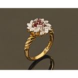 An 18 ct gold platinum, diamond and ruby set ring. Gross weight 6.8 grams.