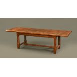 A good quality oak reproduction refectory style table, with segmented top,