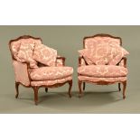 A pair of good continental style mahogany upholstered armchairs with loose cushions with moulded