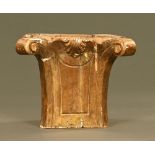 An 18th century architectural giltwood stand, in the form of an ionic capital.