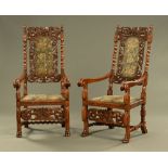 A large pair of late Victorian carved oak throne type armchairs,