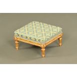 A 19th century giltwood low stool,