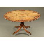 A good quality mahogany games table, circular,