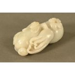 A Chinese carved jade paperweight in the form of an octopus. Length 10 cm.