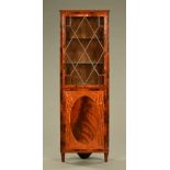 An Edwardian mahogany corner cupboard,