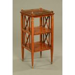 An early 20th century continental mahogany square three tier occasional table,