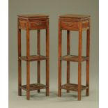 A pair of Chinese hardwood stands, each fitted with a drawer and two shelves.