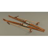 A pair of vintage Sport-Hackl wooden skis with Kandahar fittings, together with poles.