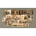 Three cased Victorian photographs, another and a collection of unmounted photographs.