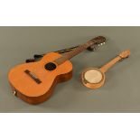 A vintage Hofner flamenco guitar, together with a Ukulele.