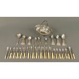 A quantity of Art Deco silver plated cutlery, together with a silver plated fruit basket,