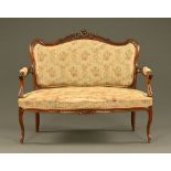 An early 20th century French style settee,