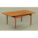 A 19th century mahogany extending dining table with single centre leaf, with pullout action,