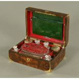 A Victorian brass bound burr wood toilet box, with fitted interior. Width 28 cm.
