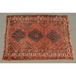 An Eastern fringed rug,