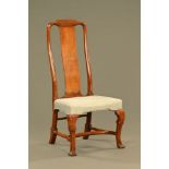 An early 18th century walnut side chair with crinoline stretcher and cabriole legs.