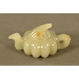 A Chinese green jade teapot. Length 7.5 cm.