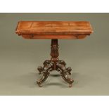 An early 19th century rosewood turnover top card table, with rounded corners,