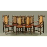 A set of two carver arm and five single Carolean style dining chairs,