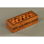 A 19th century Tunbridge ware box, with parquetry top and floral band to centre. Height 7.