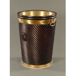 A large George III style mahogany brass bound peat bucket, with metal liner.