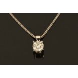 An 18 ct gold diamond pendant, diamond weight +/- 1.01 carats.