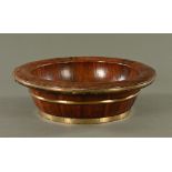 An antique brass bound yew wood dough bowl. Diameter 56 cm.