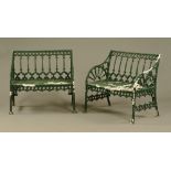 A pair of green painted alloy garden benches,