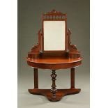 A Victorian mahogany Duchess dressing table, demi lune with turned front leg and low platform shelf.