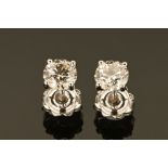 A pair of 18 ct gold diamond stud earrings, diamonds +/- 2.03 carats.