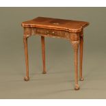 An early 18th century walnut card table,